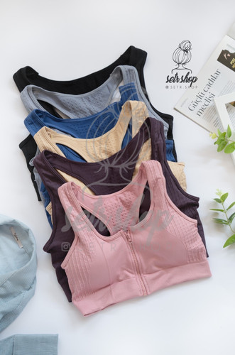 نیمتنه ورزشی زنانه جلو زیپدار با کاپ متحرک در سایزبندی M تا XXL و رنگهای صورتی، کرم، آبی، طوسی، بنفش