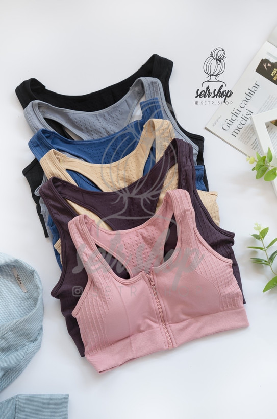 نیمتنه ورزشی زنانه جلو زیپدار با کاپ متحرک در سایزبندی M تا XXL و رنگهای صورتی، کرم، آبی، طوسی، بنفش