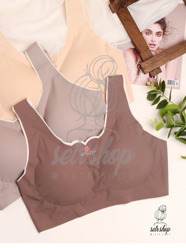 نیمتنه ورزشی زنانه لیزری وارداتی با کاپ متحرک در سایز ۳۶ تا ۴۲ و رنگهای کرم، فیلی، نسکافهای، طوسی