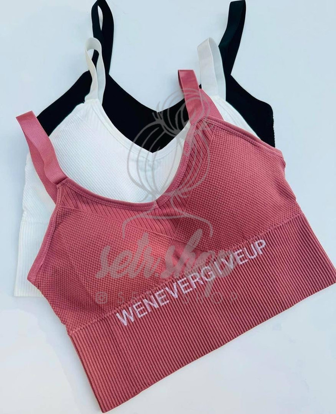 نیمتنه گنی زنانه وارداتی با بند قابل تنظیم و کاپ متحرک در رنگهای مختلف